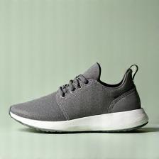 Eco-friendly gray sneakers in minimalist urban style